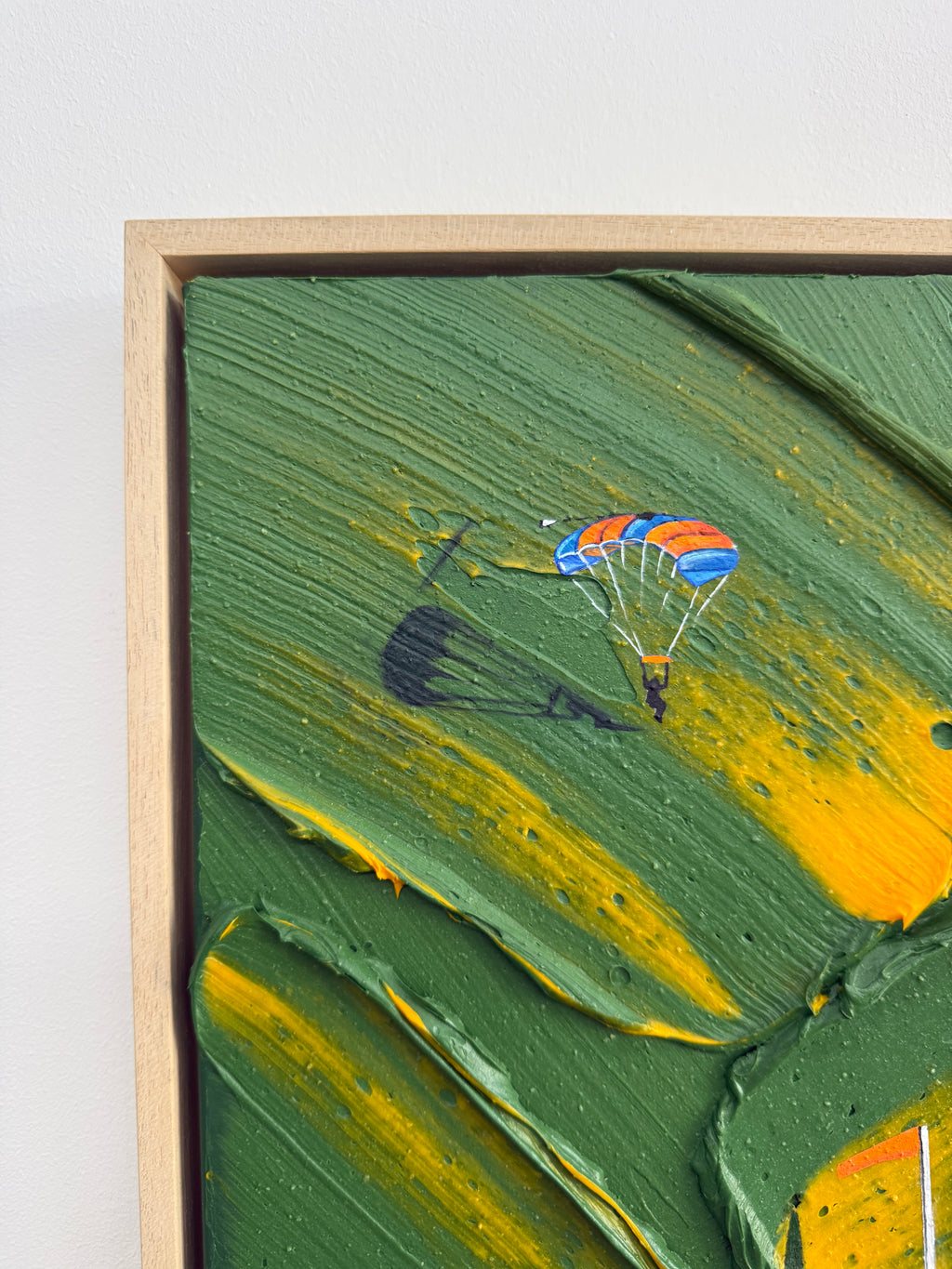 Original Morocco skydiving artwork featuring parachutes and vibrant yellow wildflowers by Katie Hollinshead