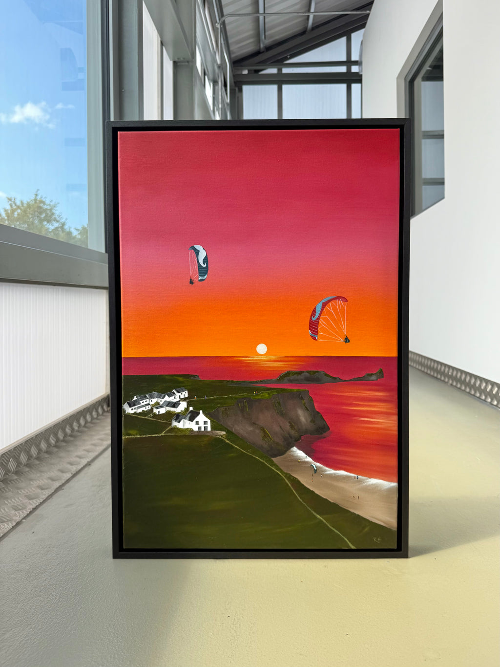 Original Rhossili oil painting featuring paragliding and parakite wings above the Gower Coast at sunset