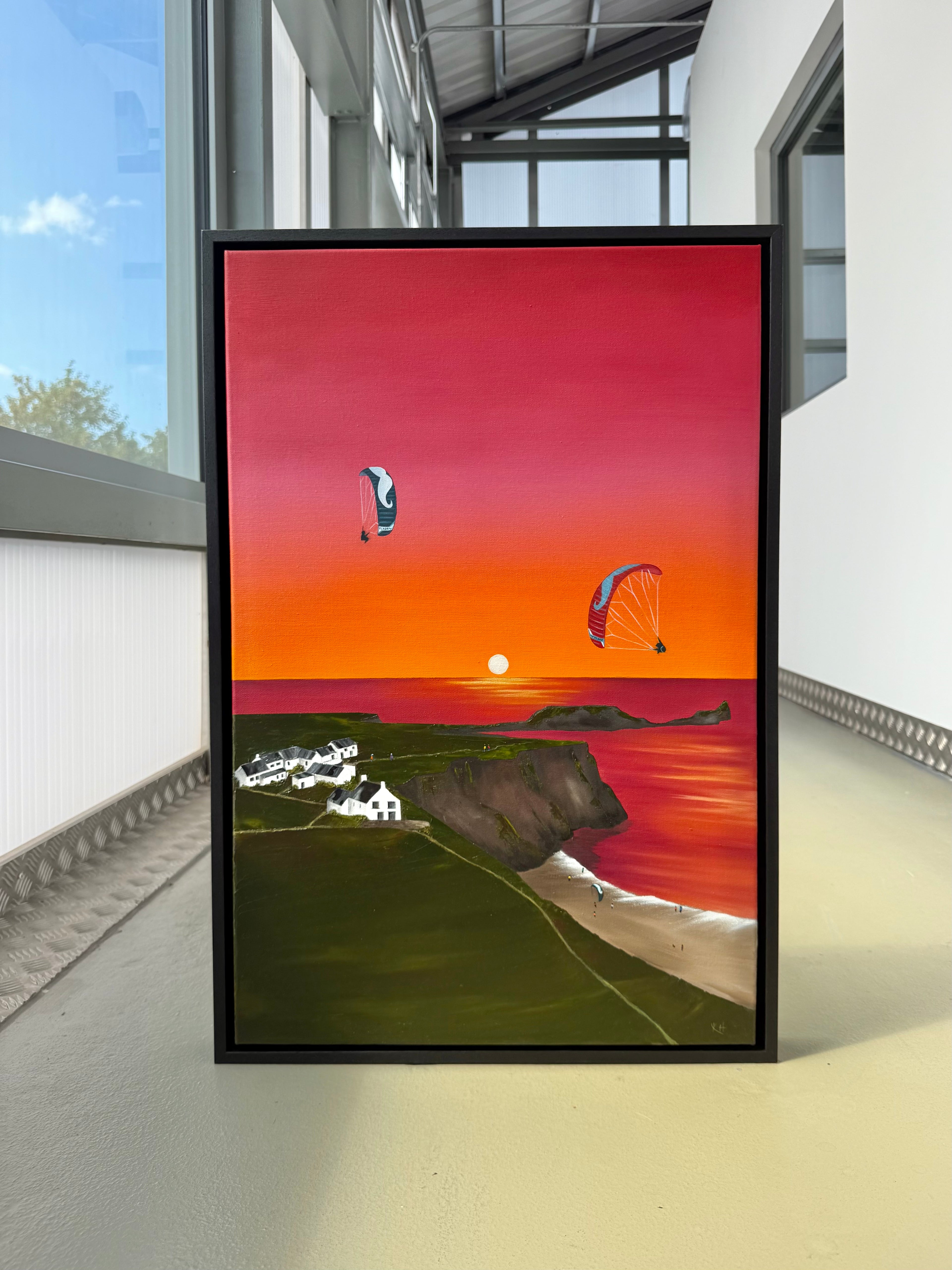 Original Rhossili oil painting featuring paragliding and parakite wings above the Gower Coast at sunset